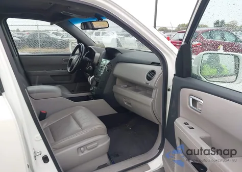 2011 Honda Pilot Touring z USA, uszkodzony, nr VIN 5FNYF4H91BB085186